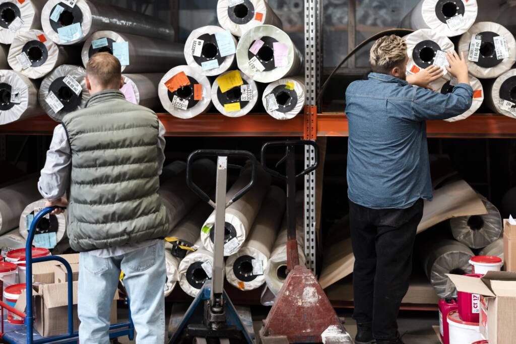 Ramson Export team checking fabric colours and quality before shipment.