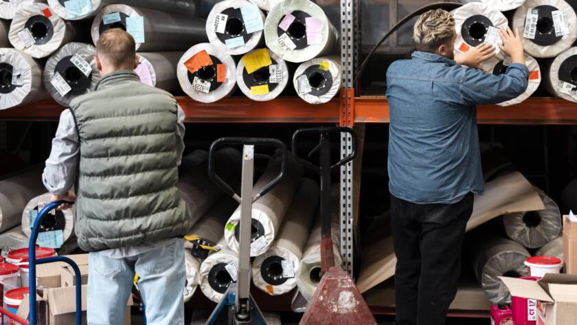 Ramson Export team checking fabric colours and quality before shipment.